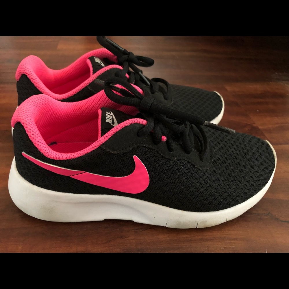 Black and pink Nike sneakers
